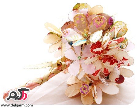 دسته گل عروس همراه با گل های زیبا