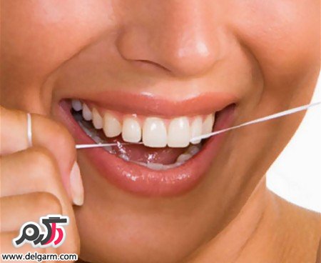 دلیل استفاده مرتب از نخ دندان